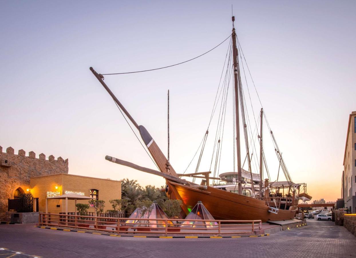 Radisson Blu Hotel, Kuwait Кувейт Экстерьер фото The traditional dhow