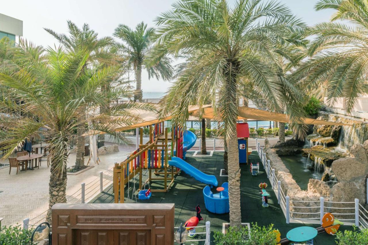 Radisson Blu Hotel, Kuwait Кувейт Экстерьер фото The Village